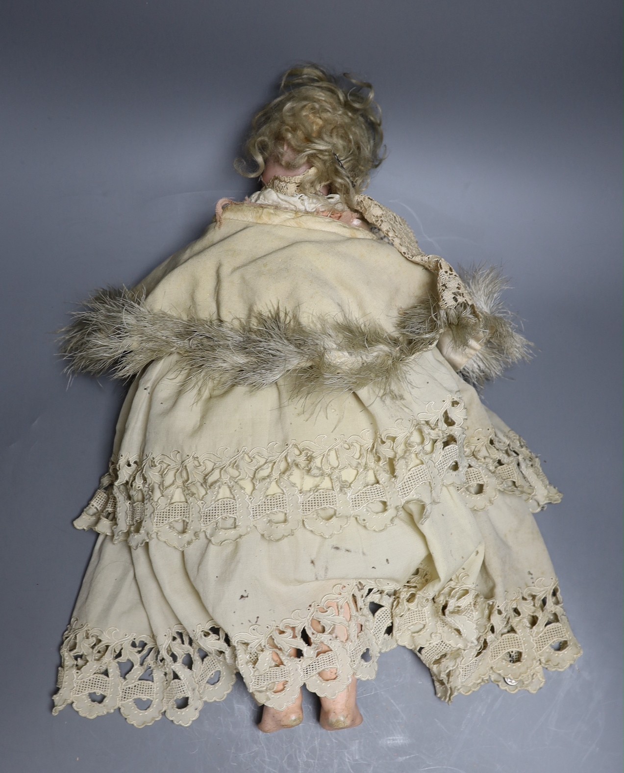 A late 19th century German bisque head doll, impressed mark 300/9, 53cm